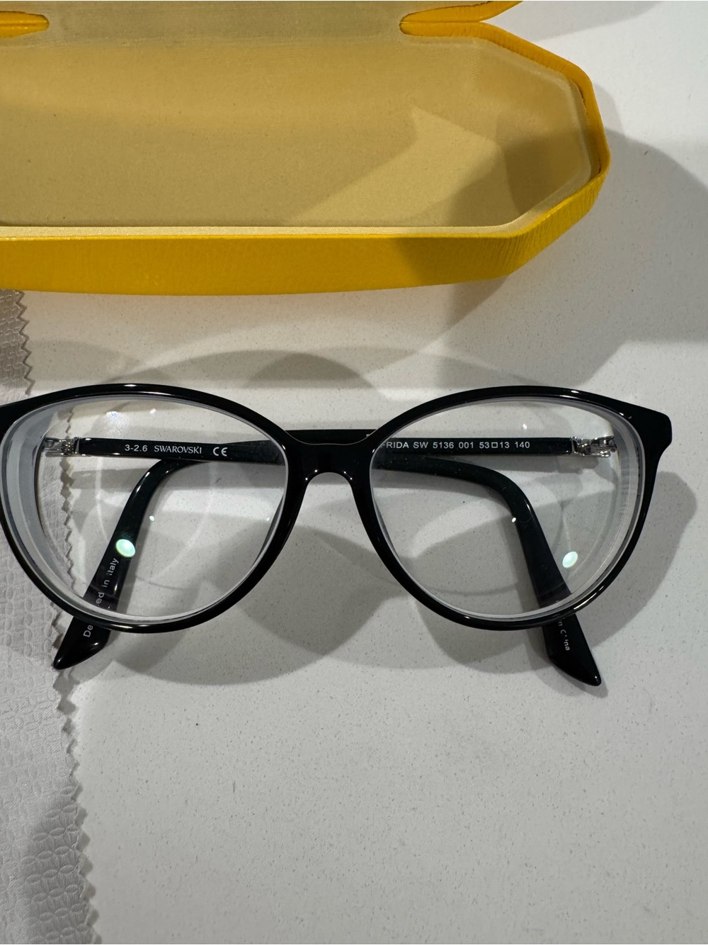 Swarovski Black Round Optical Glasses with Subtle Silver Accents